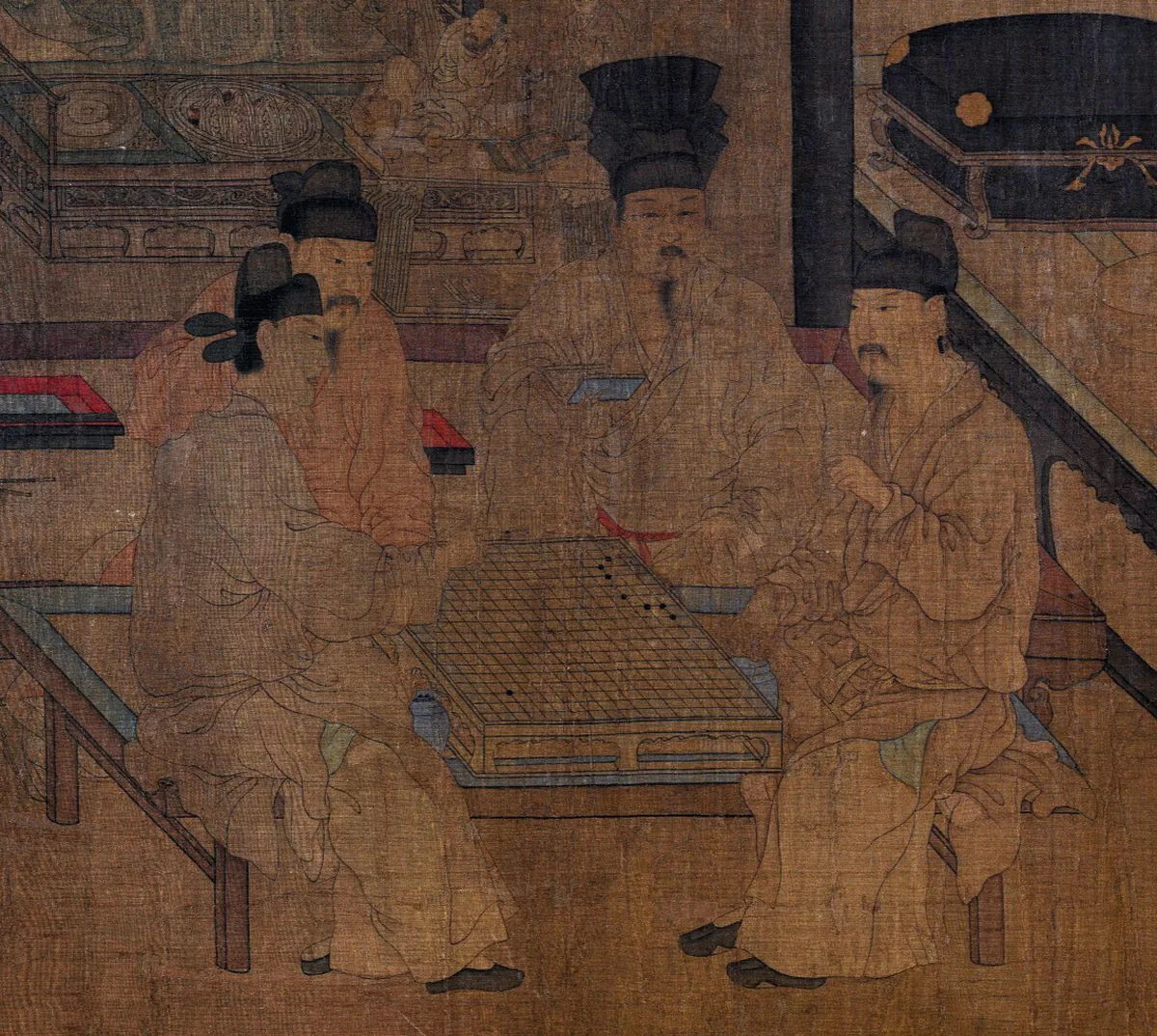 Four men in robes gathered around a Go board in a 10th century Chinese painting